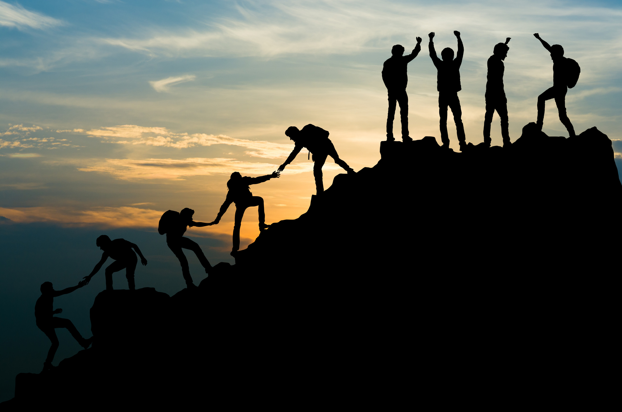 Screenshot_2025-04-22_at_8_44_05_AM Group of people climbing a mountain together